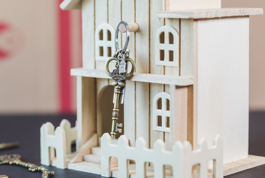 Key Hanging on Wooden Doll House